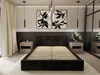 A modern bedroom with a black bed frame and slatted base. Produktbild-Vorschau