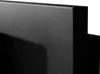 A close-up view of the textured black frame of a bio-fireplace. Voir les images du produit