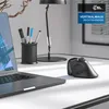A desk setup with a laptop, a pen holder, a lamp, and a vertical mouse. Produktbild-Vorschau
