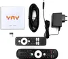 A flat lay of a streaming box, two remote controls, a power adapter, an HDMI cable, and a user manual. Produktbild-Vorschau