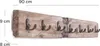 A wooden coat rack with multiple hooks mounted on a white background. Náhled obrázku produktu