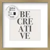 A framed picture with the words "BE CREATIVE" printed on a light background, set within a wooden frame. Náhľad obrázku produktu
