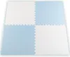 Four interlocking foam puzzle mats, two white and two light blue, arranged in a 2x2 grid. Anteprima dell’immagine prodotto