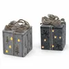 Two illuminated gift boxes with Christmas motifs. Náhľad obrázku produktu