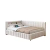 A beige L-shaped bed with a headboard featuring storage shelves and LED lighting. Podgląd zdjęcia produktu