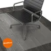 A black office chair is placed on a transparent floor mat on a wooden floor. Produktbild-Vorschau