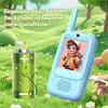 A blue walkie-talkie is shown next to a battery illustration in a grassy outdoor setting with trees and flowers. Produktbild-Vorschau