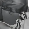 Close-up view of the interior of a gray waterproof bag or wader. Produktbild-Vorschau