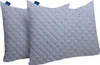 Two grey quilted pillowcases are shown side-by-side against a white background. Podgląd zdjęcia produktu