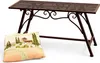 A brown metal garden bench with a decorative pillow in front of it, set against a white background. Náhľad obrázku produktu