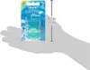A hand is holding a package of Oral-B Satin Floss. Produktbild-Vorschau