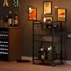 A bar cart filled with bottles and glassware is set up in a room with decorative art on the wall and a wine fridge. Produktbild-Vorschau