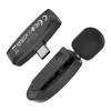 Two black wireless microphones with USB-C connectors are shown on a white background. Anteprima dell’immagine prodotto