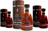 Several bottles and cylindrical packaging of Arehucas rum are displayed against a white background. Produktbild-Vorschau