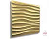 A gold-colored 3D wall panel with a wavy texture, shown from a side angle against a white background. Produktbild-Vorschau