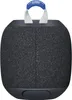 A black portable speaker with a blue and white handle on top. Produktbild-Vorschau