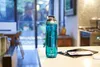 A blue Contigo water bottle is placed on a kitchen counter next to a tablet and earbuds. Anteprima dell’immagine prodotto