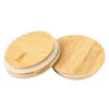 Two bamboo lids with white seals are shown on a white background. Produktbild-Vorschau