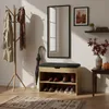 An entryway scene with a shoe cabinet, coat rack, mirror, and rug. Podgląd zdjęcia produktu