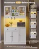 A white kitchen cabinet with LED lighting and various items displayed inside and on its surfaces. Voir les images du produit