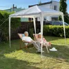 An elderly couple relaxing in deck chairs under a white gazebo in a backyard. Produktbild-Vorschau