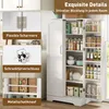 A white kitchen cabinet with its doors open, displaying various food items and kitchenware on its shelves. Insets highlight specific features like hinges, a cabinet latch, and a metal knob. Anteprima dell’immagine prodotto