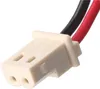 A close-up view of a white electrical connector with two wires, one black and one red, emerging from it. Produktbild-Vorschau