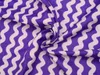 A close-up, flat lay image of purple and white wavy patterned fabric. Produktbild-Vorschau