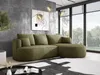 A modern living room with a green sectional sofa, abstract art on the wall, and large windows overlooking trees. Náhľad obrázku produktu