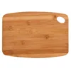 A top-down view of a bamboo cutting board with a handle hole. Anteprima dell’immagine prodotto