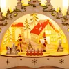 A wooden Christmas decoration depicting a winter scene with two figures having a snowball fight. Produktbild-Vorschau