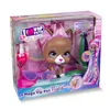 A toy styling head of a dog character named Nyla, presented in its retail packaging. Podgląd zdjęcia produktu