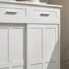 A close-up view of a white cabinet with two drawers on top and sliding doors below. Produktbild-Vorschau