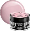 A jar of pink gel nail polish with its lid off, showing the product inside and some branding. Náhled obrázku produktu