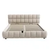 A beige upholstered bed frame with an open slatted base, shown from the front. Produktbild-Vorschau