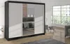 A modern bedroom with a large mirrored wardrobe. Náhled obrázku produktu