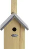 A wooden birdhouse with a metal roof, mounted on a wooden plank. Produktbild-Vorschau