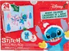 A red box with a Disney Stitch themed advent calendar. The calendar is light blue with images of Stitch and Angel in winter attire. A small figure of Stitch is shown in a circular cutout. Produktbild-Vorschau