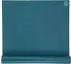 A teal yoga mat is rolled up at the bottom, with the rest of the mat unrolled and lying flat. Produktbild-Vorschau