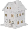 A white wooden house decoration with illuminated windows. Podgląd zdjęcia produktu