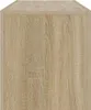 A close-up view of a wooden surface with a distinct grain pattern. Náhled obrázku produktu