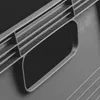 A close-up view of a gray plastic storage box, focusing on the handle and ribbed texture. Náhled obrázku produktu