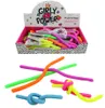 A display box of colorful, glittery, string-like toys, with some of the toys laid out in front of the box. Produktbild-Vorschau