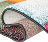 A close-up view of the edge and underside of a folded rug, showing the texture and binding. Náhled obrázku produktu