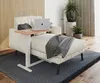 A modern living room setting with a chaise lounge and a laptop table. Produktbild-Vorschau