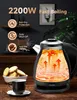 A cutaway view of a kettle showing the heating element and water circulation, with a cup of tea and cookies in the foreground. Produktbild-Vorschau