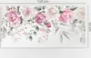 A close-up of a floral wall decal with roses and leaves. Náhled obrázku produktu