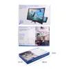 The image shows the packaging of a phone screen amplifier, with different views of the product and its use. Náhled obrázku produktu