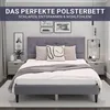 A bedroom scene featuring a upholstered bed with bedding and decorative pillows. Voir les images du produit