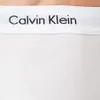 A close-up of the waistband of white underwear with the Calvin Klein logo. Produktbild-Vorschau